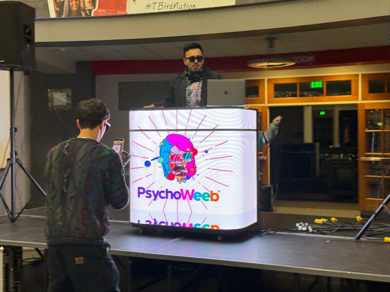 LED desk rental branding the front of a booth at SUU