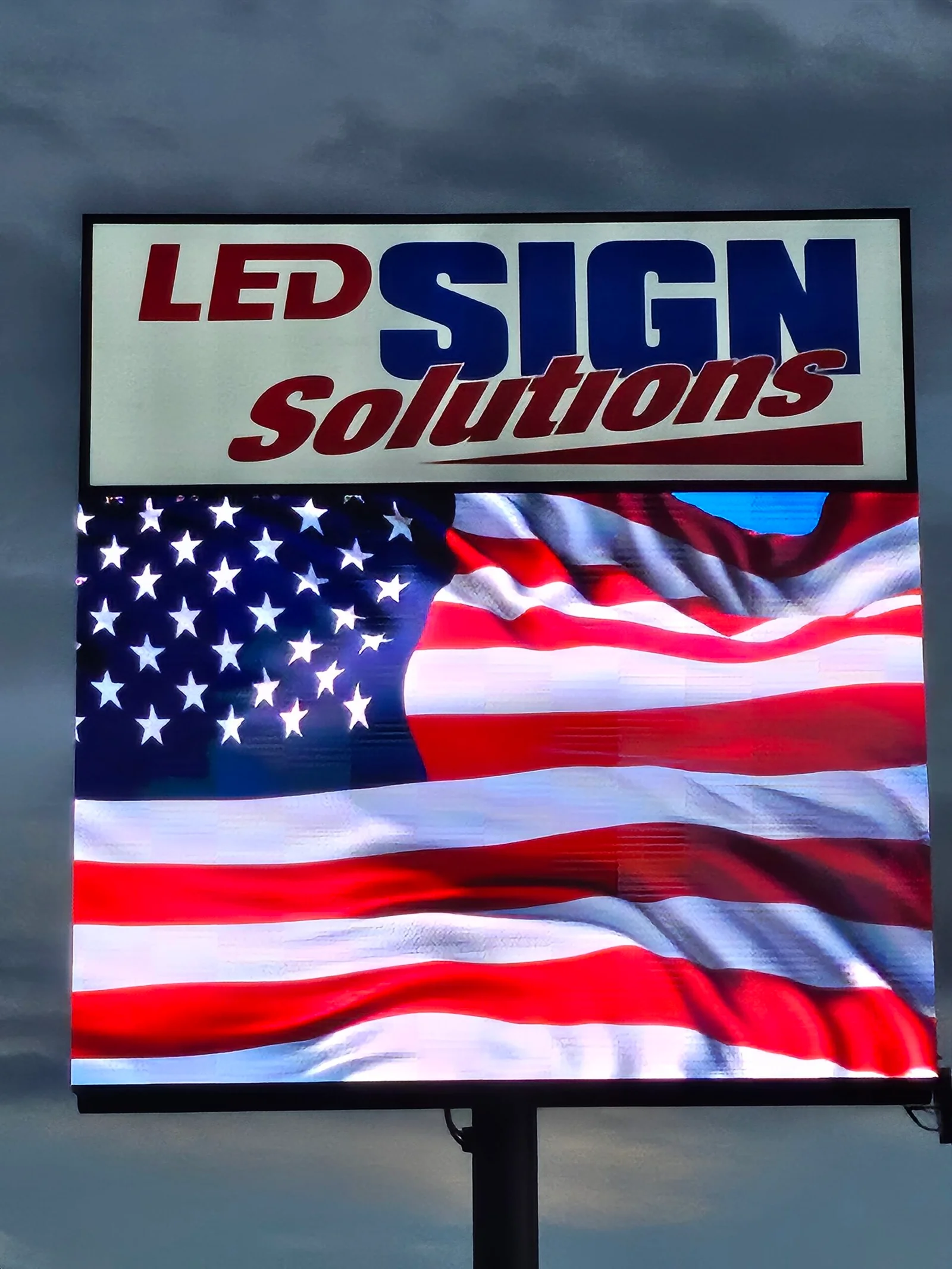 C‑Series LED sign solution on a storefront pole at LED Sign Solutions in Salt Lake City, Utah